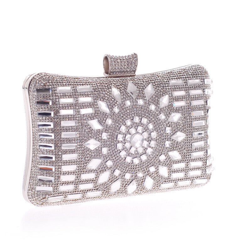 a Diamond-Studded Evening Clutch, an exquisite accessory adorned with dazzling diamonds, perfect for formal events and special occasions.