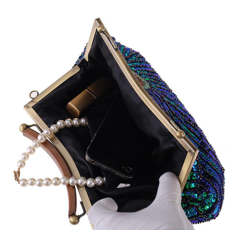a Vintage Handcrafted Evening Bag, an elegant and timeless accessory perfect for formal occasions and special events.