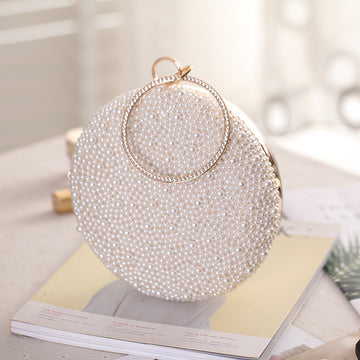 a Pearl and Diamond Evening Bag: Timeless Elegance in Hand, a sophisticated and luxurious accessory perfect for formal events and special occasions
