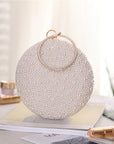 a Pearl and Diamond Evening Bag: Timeless Elegance in Hand, a sophisticated and luxurious accessory perfect for formal events and special occasions