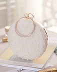 a Pearl and Diamond Evening Bag: Timeless Elegance in Hand, a sophisticated and luxurious accessory perfect for formal events and special occasions