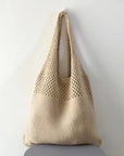 a Crochet Tote Bag, a chic and handcrafted accessory perfect for various occasions, from casual outings to beach trips.