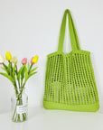 a Crochet Tote Bag, a sustainable and stylish accessory perfect for eco-conscious fashion enthusiasts.