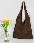 Elegant Crochet Shoulder Bag in Natural Fibers, a chic accessory for ethical fashion enthusiasts.