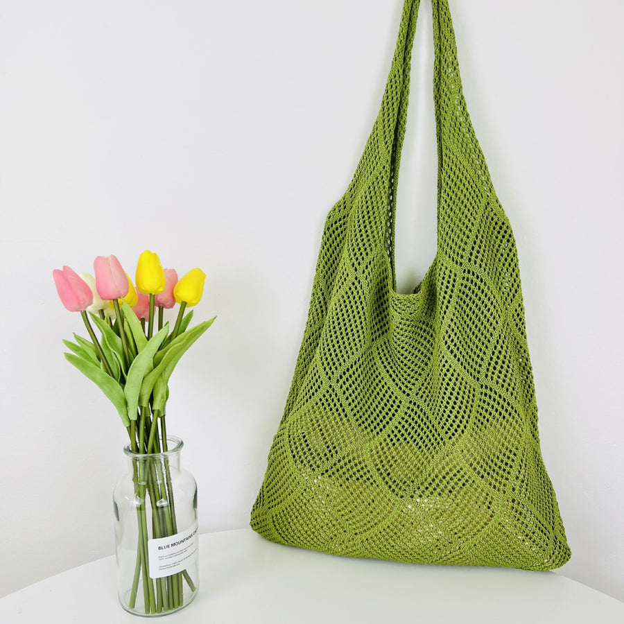 Elegant Crochet Shoulder Bag in Natural Fibers, a chic accessory for ethical fashion enthusiasts.