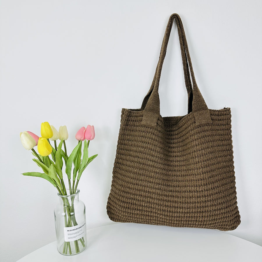 Boho-Chic Crochet Shoulder Bag, perfect for free spirits and conscious shoppers.