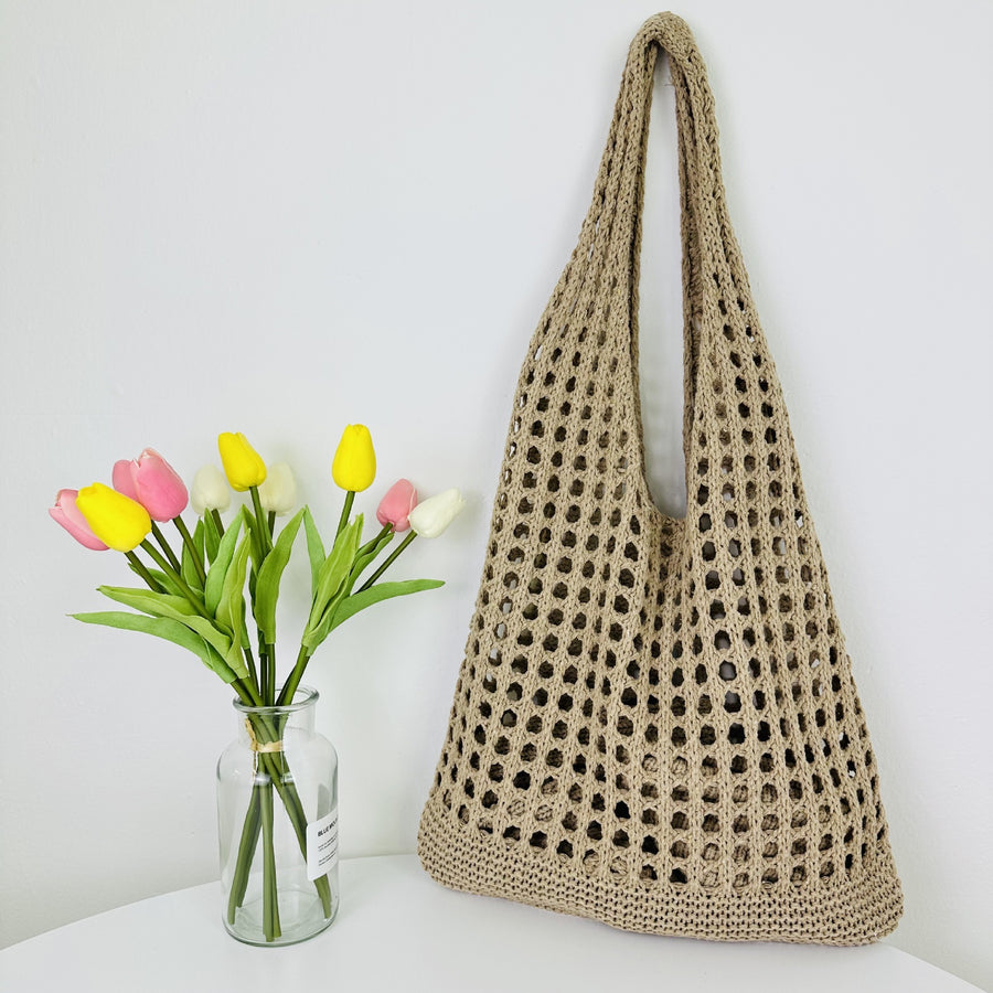 Detailed Close-up of a Boho Chic Crochet Tote Bag, a fashion-forward choice.