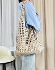 Detailed Close-up of a Boho Chic Crochet Tote Bag, a fashion-forward choice.