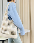 Detailed Close-up of a Boho Chic Crochet Tote Bag, a fashion-forward choice.