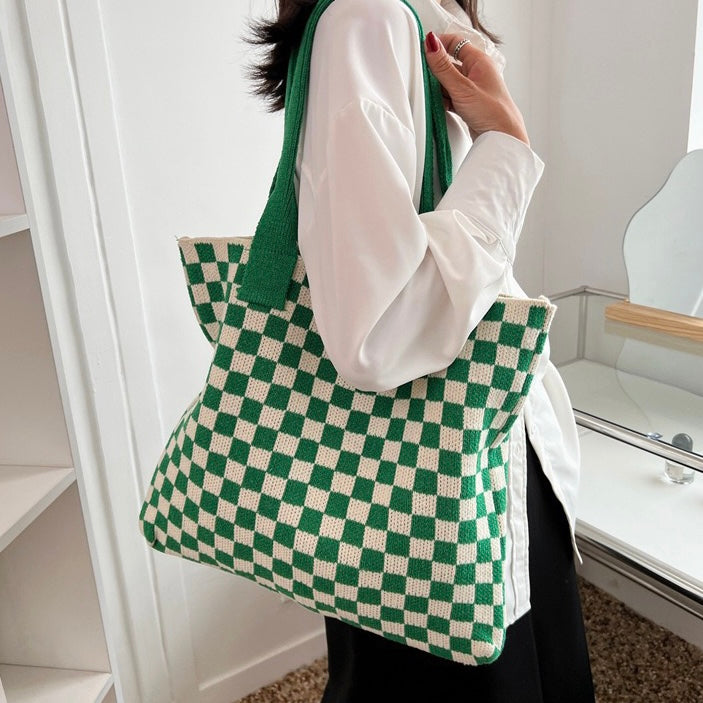 Artisanal Crochet Shoulder Bag with Bohemian Flair, an eco-conscious fashion choice.