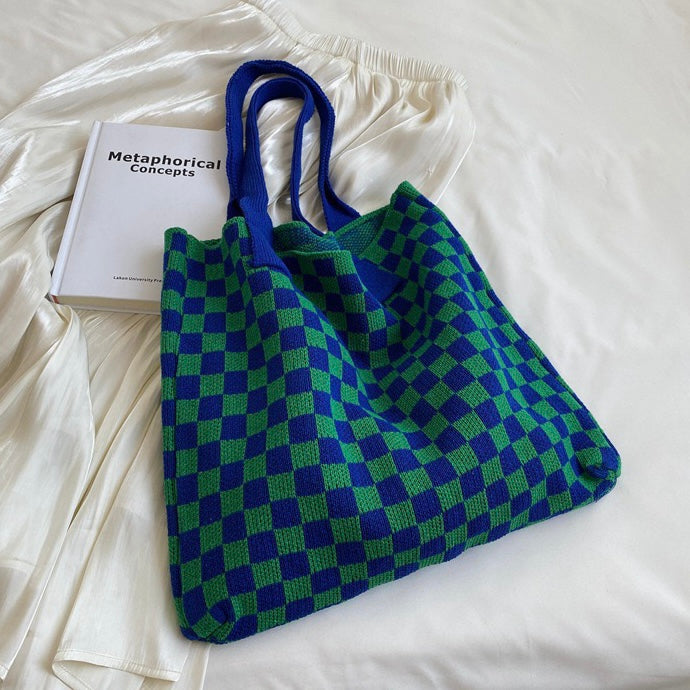 Artisanal Crochet Shoulder Bag with Bohemian Flair, an eco-conscious fashion choice.