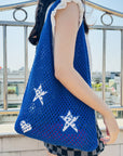 Crochet Shoulder Bag in Vibrant Colors, adding flair to your ensemble.