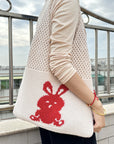 Crochet Shoulder Bag in Vibrant Colors, adding flair to your ensemble.