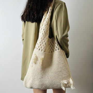 Elegant Crochet Shoulder Bag in Natural Fibers, an ethical choice for sustainable style.