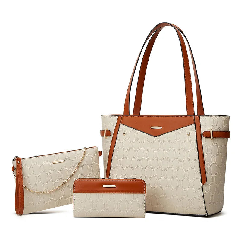 Elegant leather bag set featuring a textured geometric design, perfect for versatile use as a tote, clutch, and wallet.