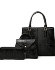 Three-piece black crocodile-textured faux leather bag set featuring a spacious tote bag with sturdy handles, a compact mini handbag with a stylish flap closure, and a matching wallet. The set exudes elegance with its bold red color and sophisticated crocodile pattern, perfect for various occasions.