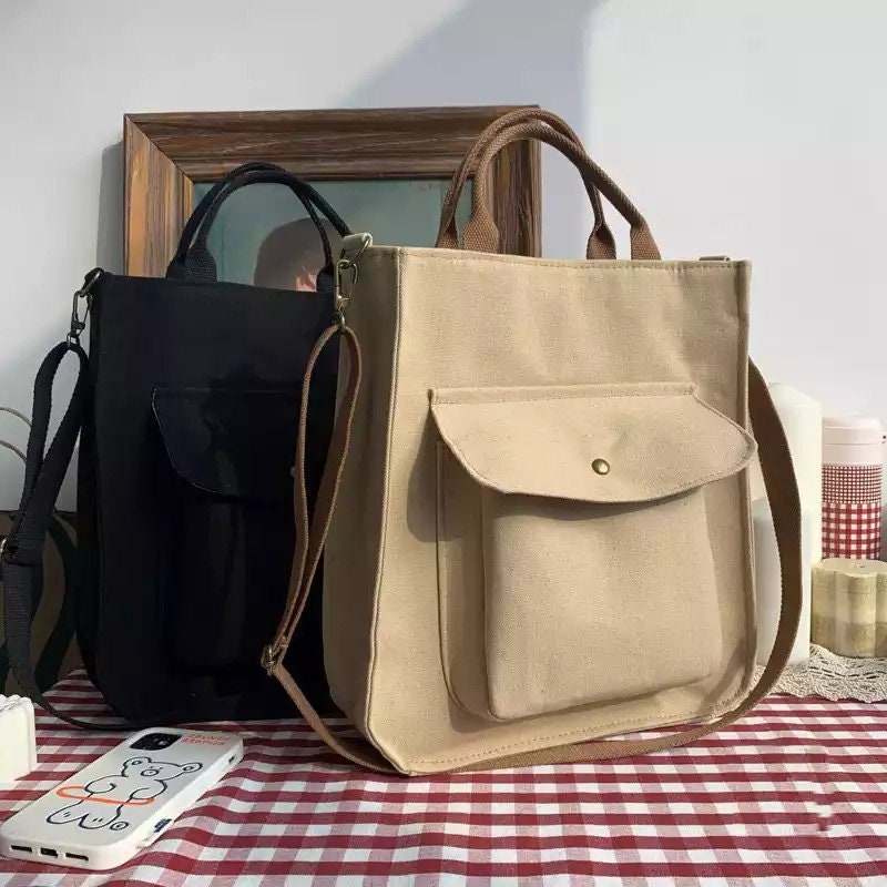 Go Anywhere with this Adjustable Canvas Bag: Perfect for Everyday Use
