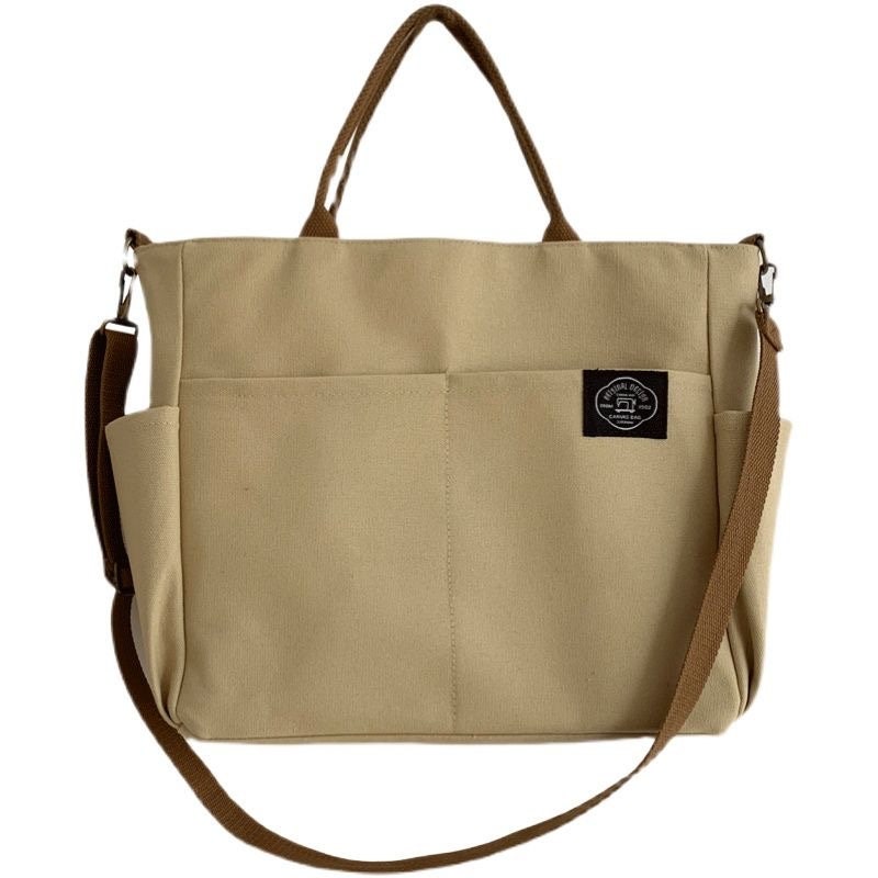 Modern Canvas Satchel with Top Handle and Shoulder Strap