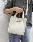 Fashionable Canvas Crossbody Bag with Flap Closure