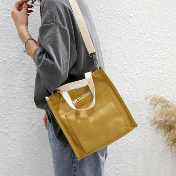 Fashionable Canvas Crossbody Bag with Flap Closure