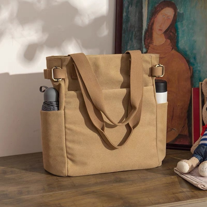 Stay Hands-Free and Chic with Our Convenient Canvas Shoulder Bag