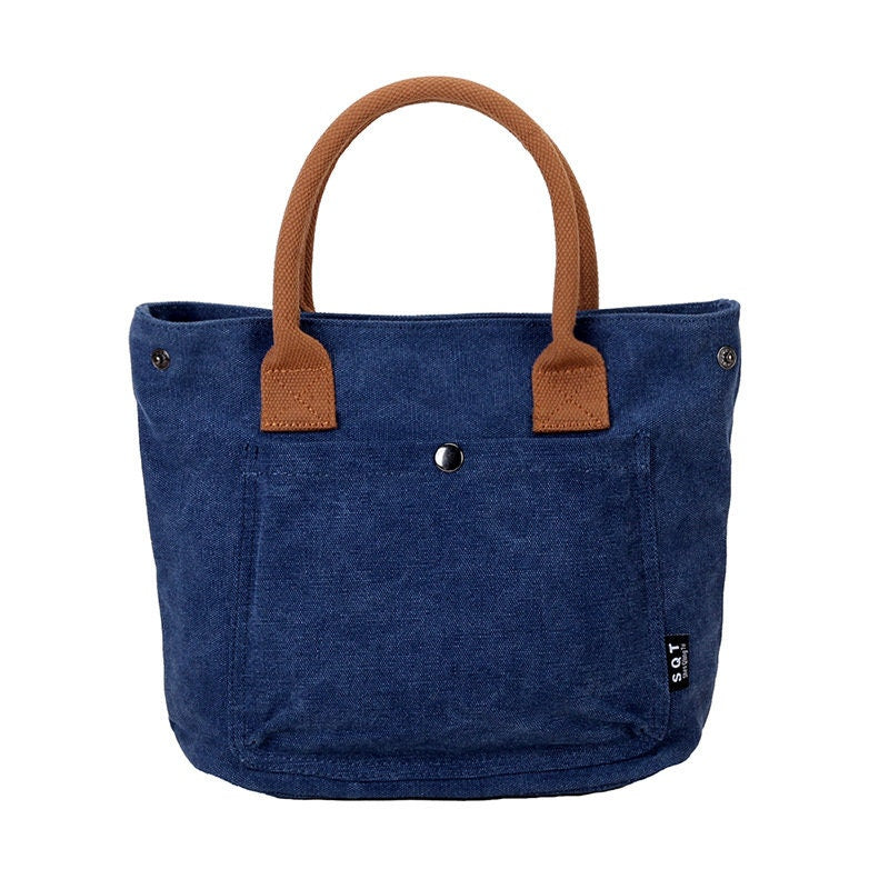 Stylish and Practical Canvas Handbag with Multiple Compartments