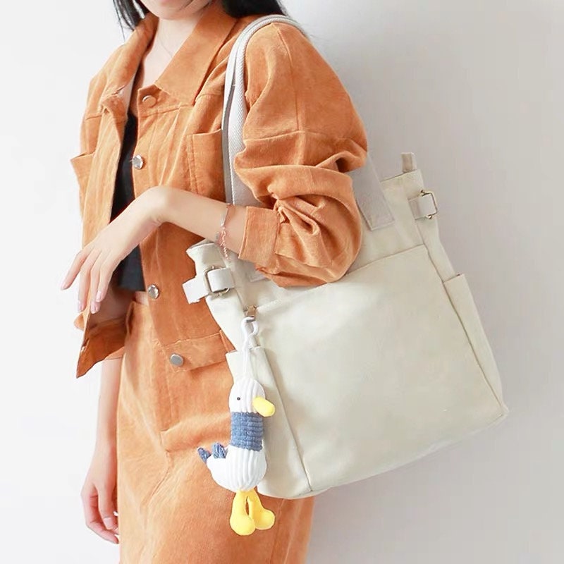 Stay Hands-Free and Chic with Our Convenient Canvas Shoulder Bag