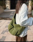 Stylish and Durable Canvas Crossbody Bag with Multiple Pockets