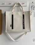 Vintage-Inspired Canvas Crossbody Bag for a Timeless Look
