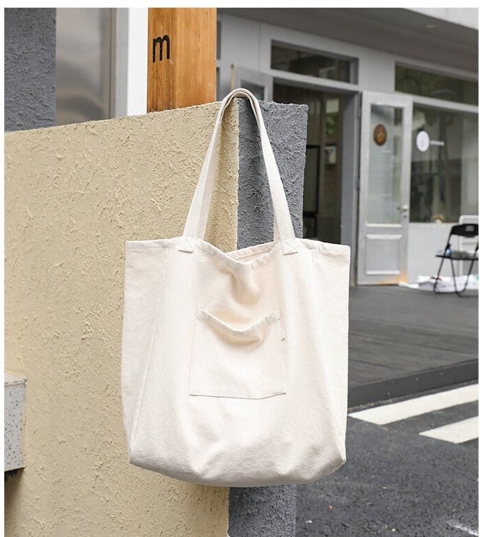 Upgrade Your Commute with Our Sleek and Minimalist Canvas Shoulder Bag
