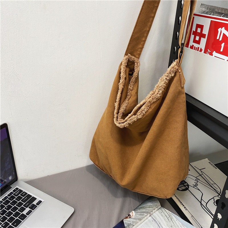 Get Ready for Your Next Adventure with Our Rugged Canvas Crossbody Bag