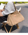 Stay Organized and Fashionable with Our Multi-Compartment Canvas Shoulder Bag
