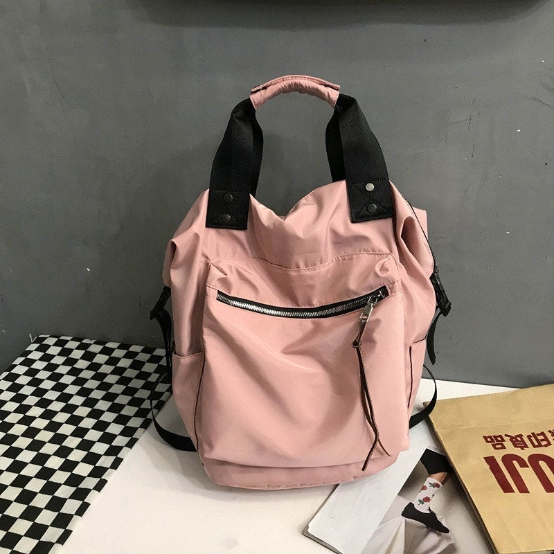 Unleash Your Fun Side with this Adorable Nylon Backpack