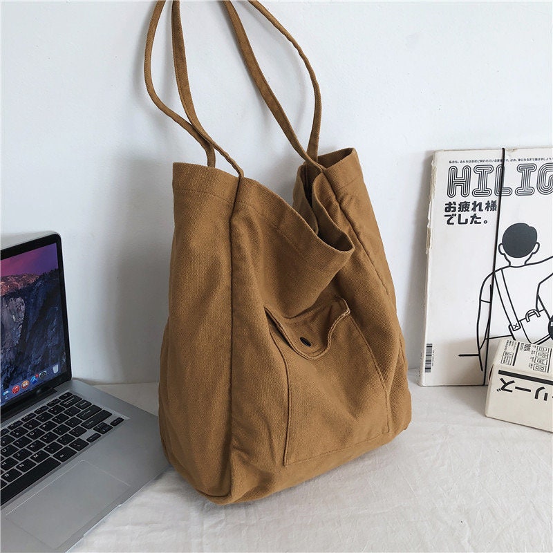 Stay on the Cutting Edge of Fashion with Our Unique and Trendy Canvas Shoulder Bag