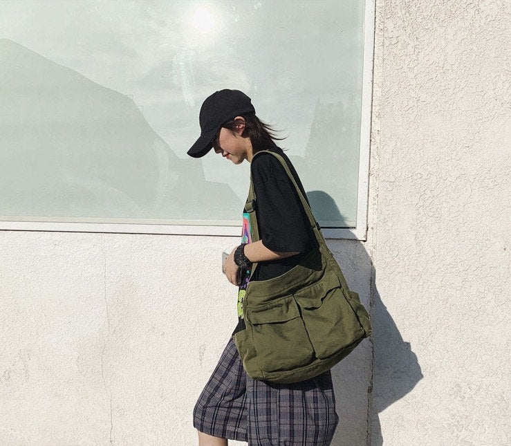 Efficiently Tackle Your Day with Our Convenient and Stylish Canvas Crossbody Bag