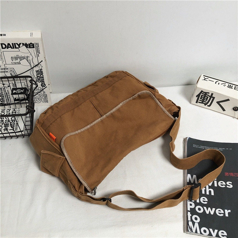 Take Your Style Game Up a Notch with Our Fashionable Canvas Crossbody Bag