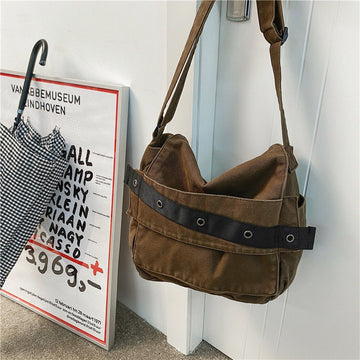 Stylish canvas messenger bag with adjustable shoulder strap and flap closure