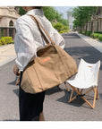 Stay Organized and Fashionable with Our Multi-Compartment Canvas Shoulder Bag