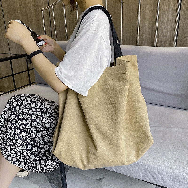 Stay Ready for Anything with Our All-Purpose Canvas Shoulder Bag