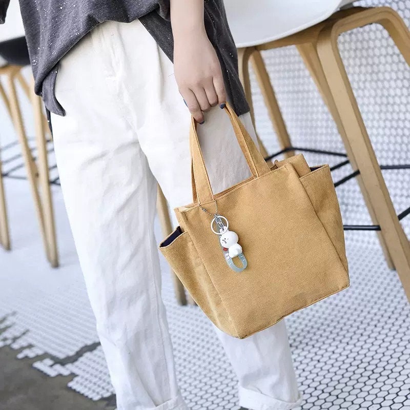 Versatile Canvas Shoulder Bag: Adjust the Strap for Your Perfect Fit