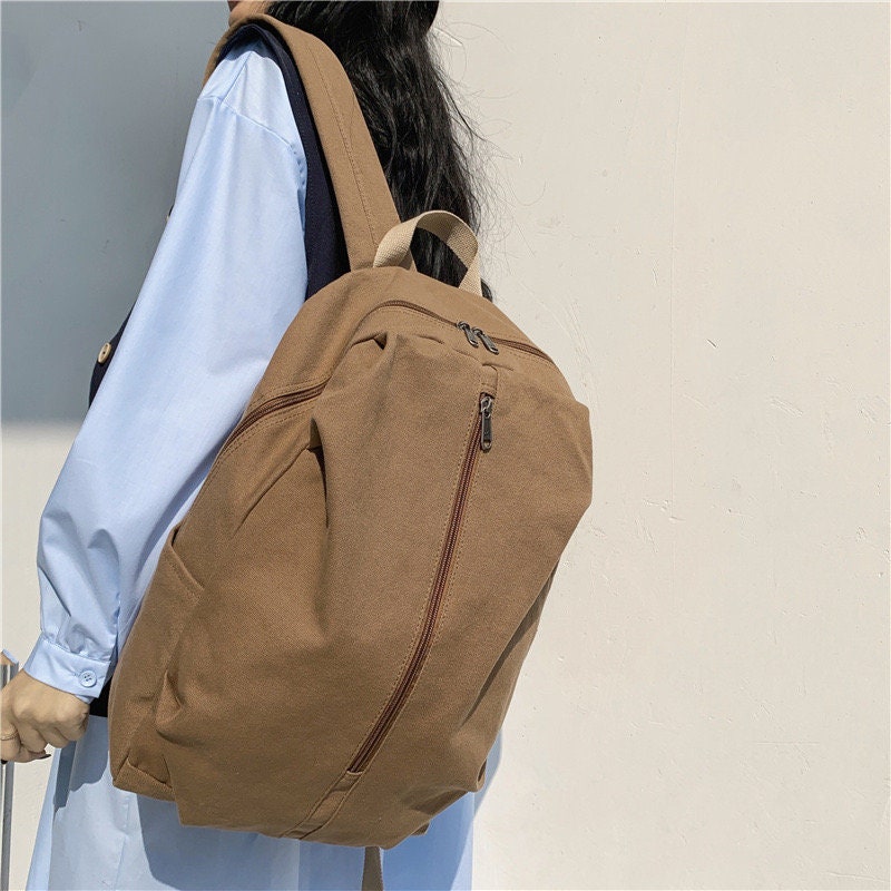 Stay Eco-Friendly and Fashionable with Our Sustainable Canvas Backpack