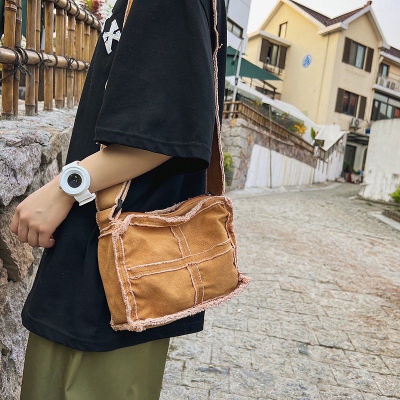 Get Ready for Adventure with Our Durable Crossbody Canvas Bag