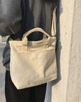 Durable Canvas Shoulder Bag with Adjustable Strap for All Occasions