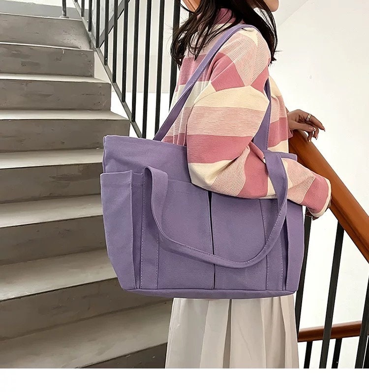 Stylish and Practical Canvas Handbag with Multiple Compartments