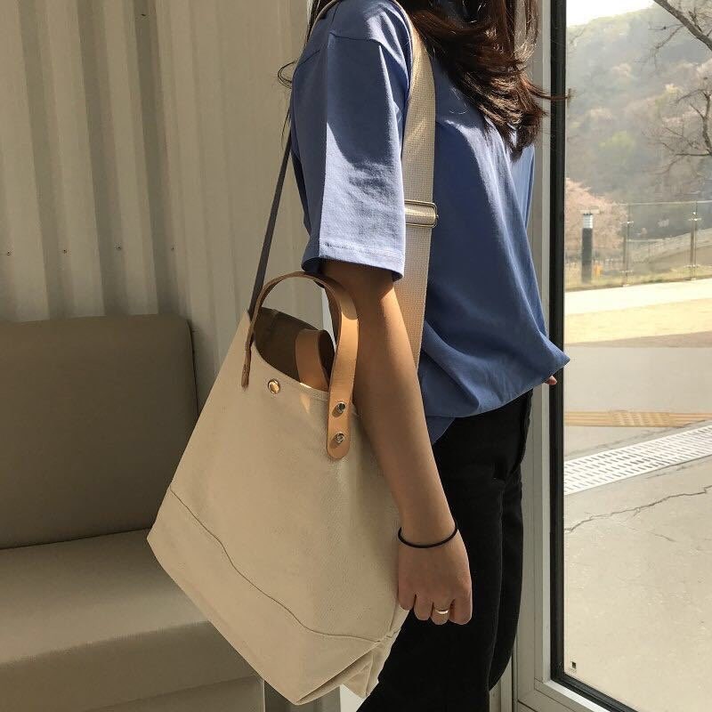 Spacious Canvas Tote Perfect for Work, Travel, and More