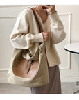 Stay Organized and Chic with Our Multi-Pocketed Canvas Crossbody Bag