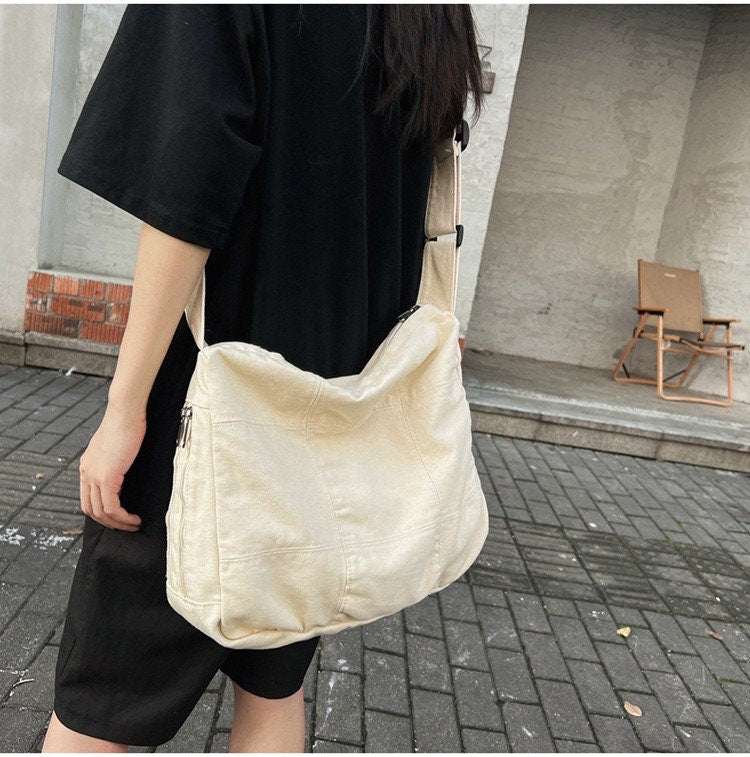 Stay Secure and Safe with Our Anti-Theft and RFID-Blocking Canvas Crossbody Bag