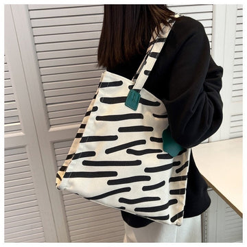 Stay Organized and Stylish with Our Multi-Functional Canvas Shoulder Bag