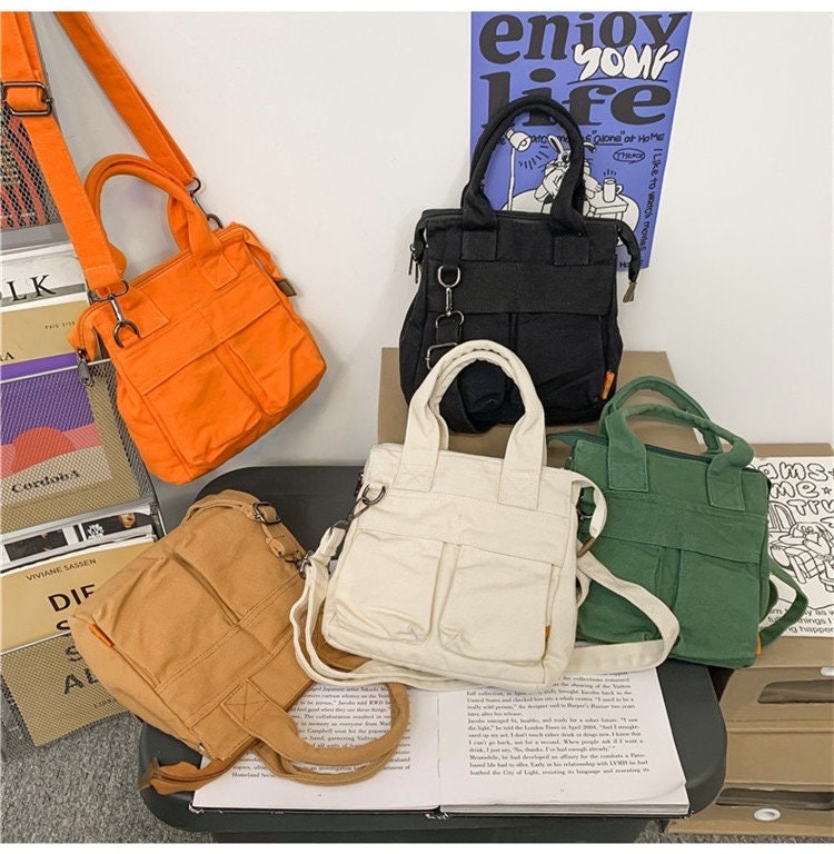 Experience Ultimate Functionality with Our Ergonomic and Easy-to-Use Canvas Crossbody Bag
