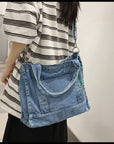 Stay Organized and Chic with Our Multi-Pocket Denim Crossbody Bag